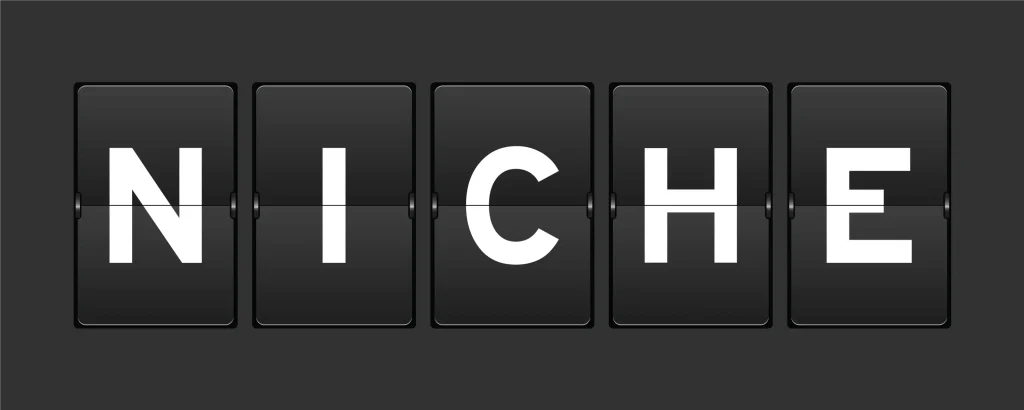 The word Niche is shown in theis image that looks like a train station sign showing a destination